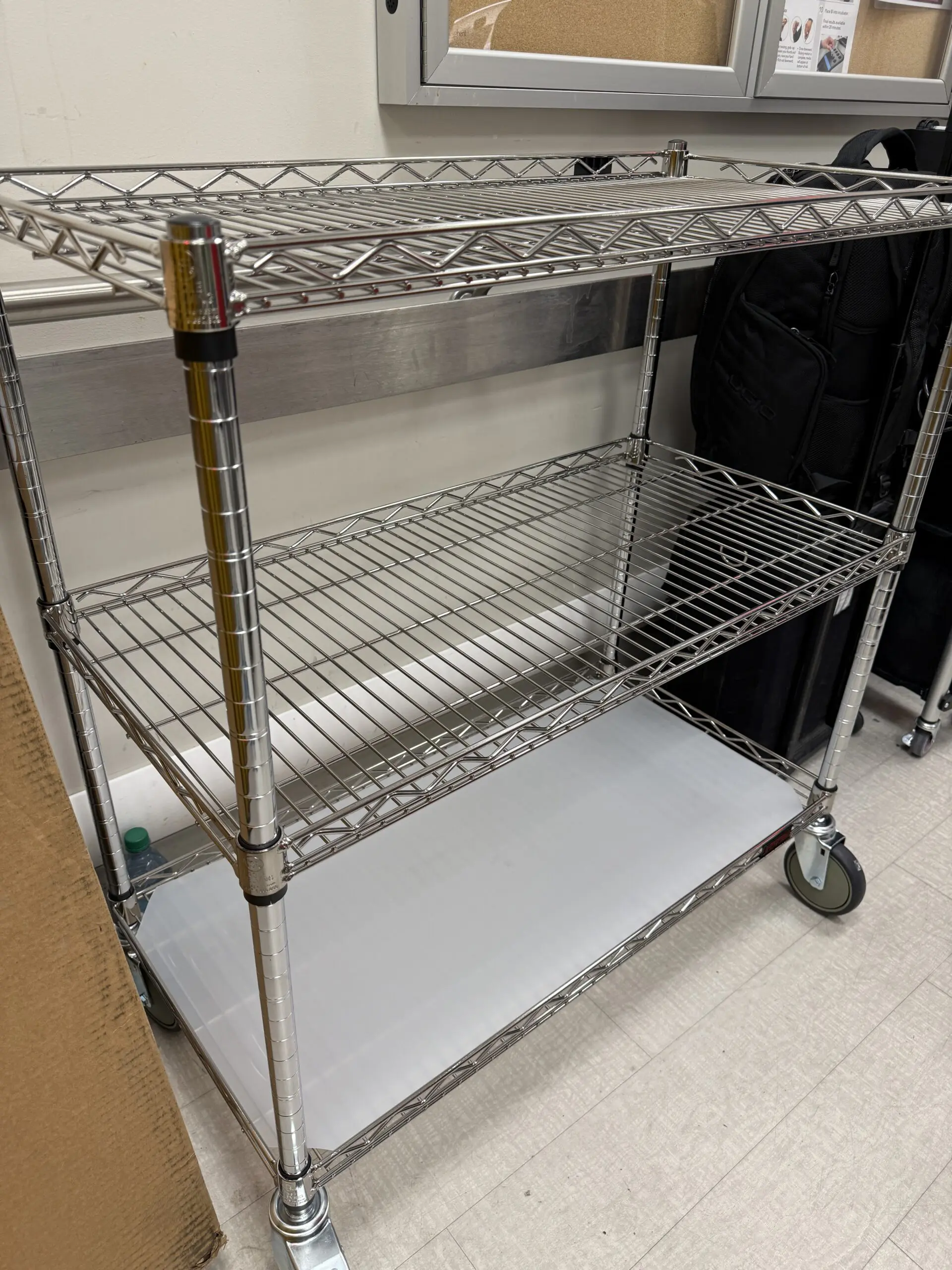 Chrome wire shelving cart with caster wheels